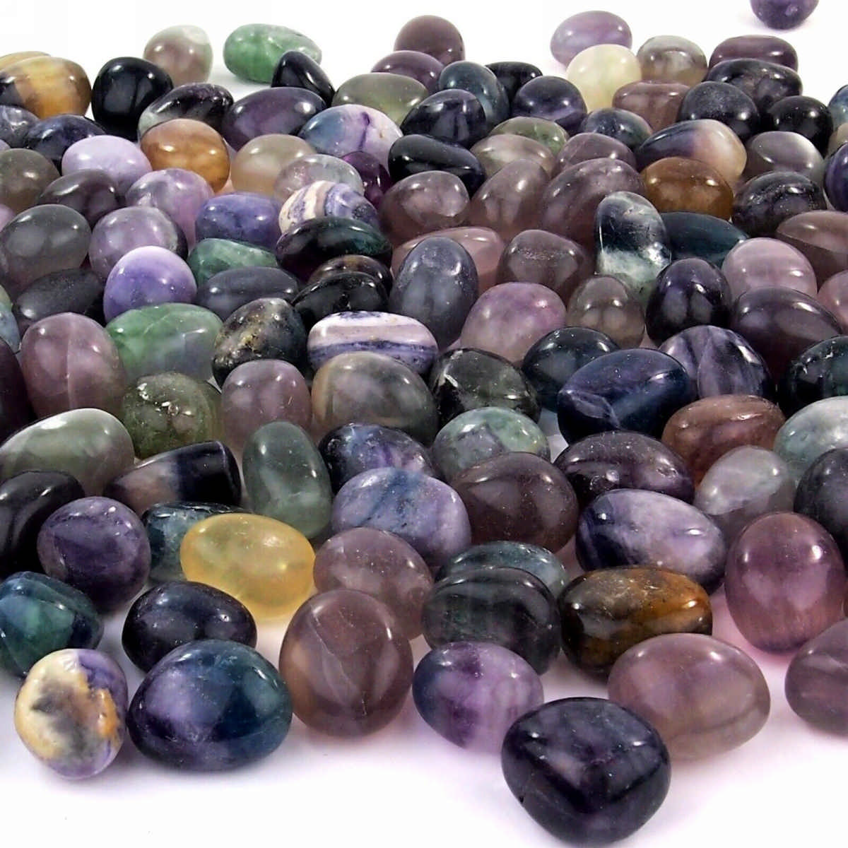 Fluorit Trommelsteine bunt Ø 23 – 33 mm Edelsteine Heilsteine bei Wunderstein24 Fluorit Trommelsteine bunt Ø 23 – 33 mm Edelsteine Heilsteine bei Wunderstein24