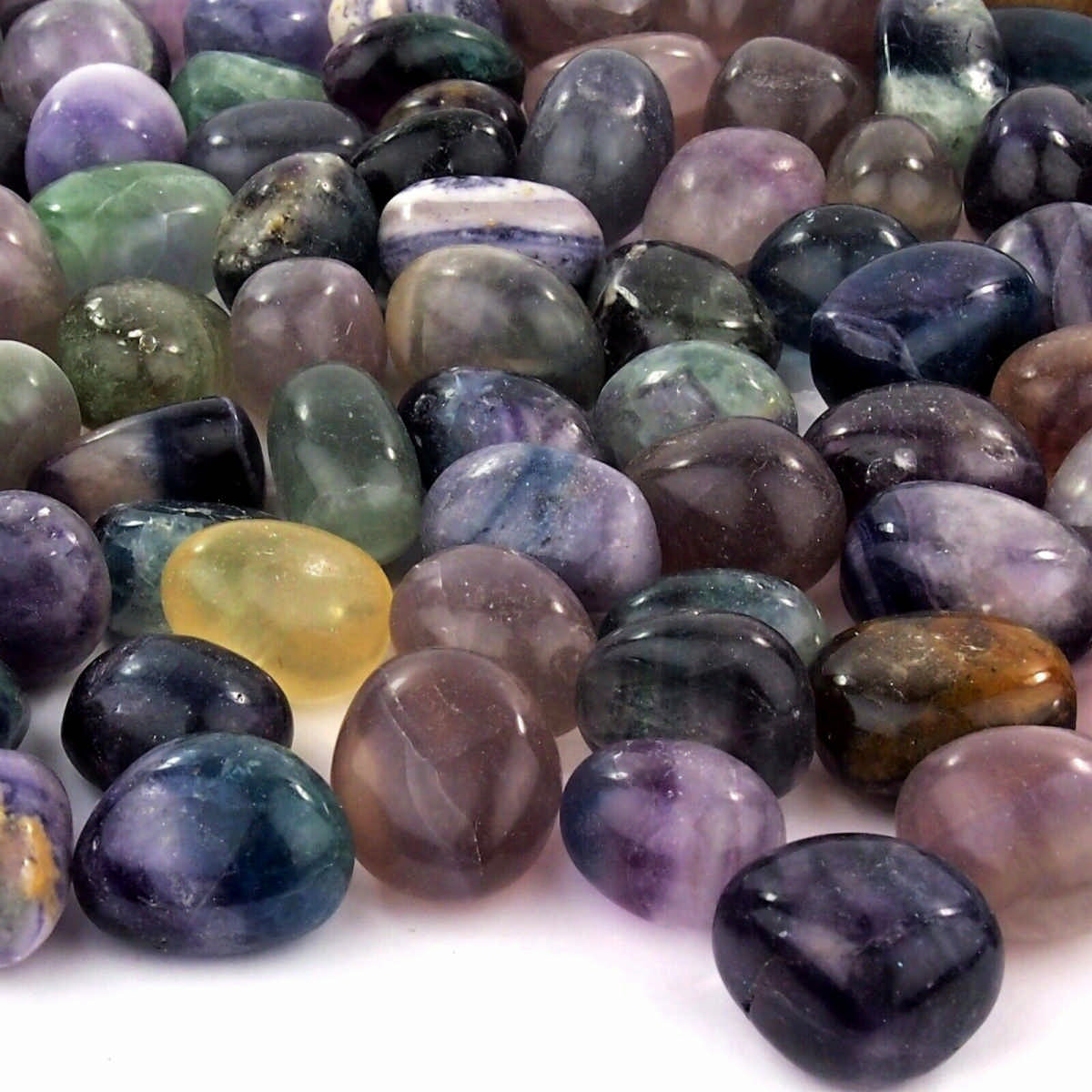 Fluorit Trommelsteine bunt Ø 23 – 33 mm Edelsteine Heilsteine bei Wunderstein24 Fluorit Trommelsteine bunt Ø 23 – 33 mm Edelsteine Heilsteine bei Wunderstein24