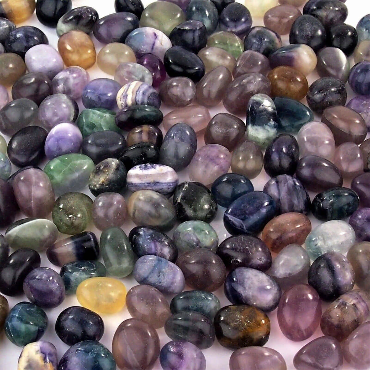 Fluorit Trommelsteine bunt Ø 23 – 33 mm Edelsteine Heilsteine bei Wunderstein24 Fluorit Trommelsteine bunt Ø 23 – 33 mm Edelsteine Heilsteine bei Wunderstein24