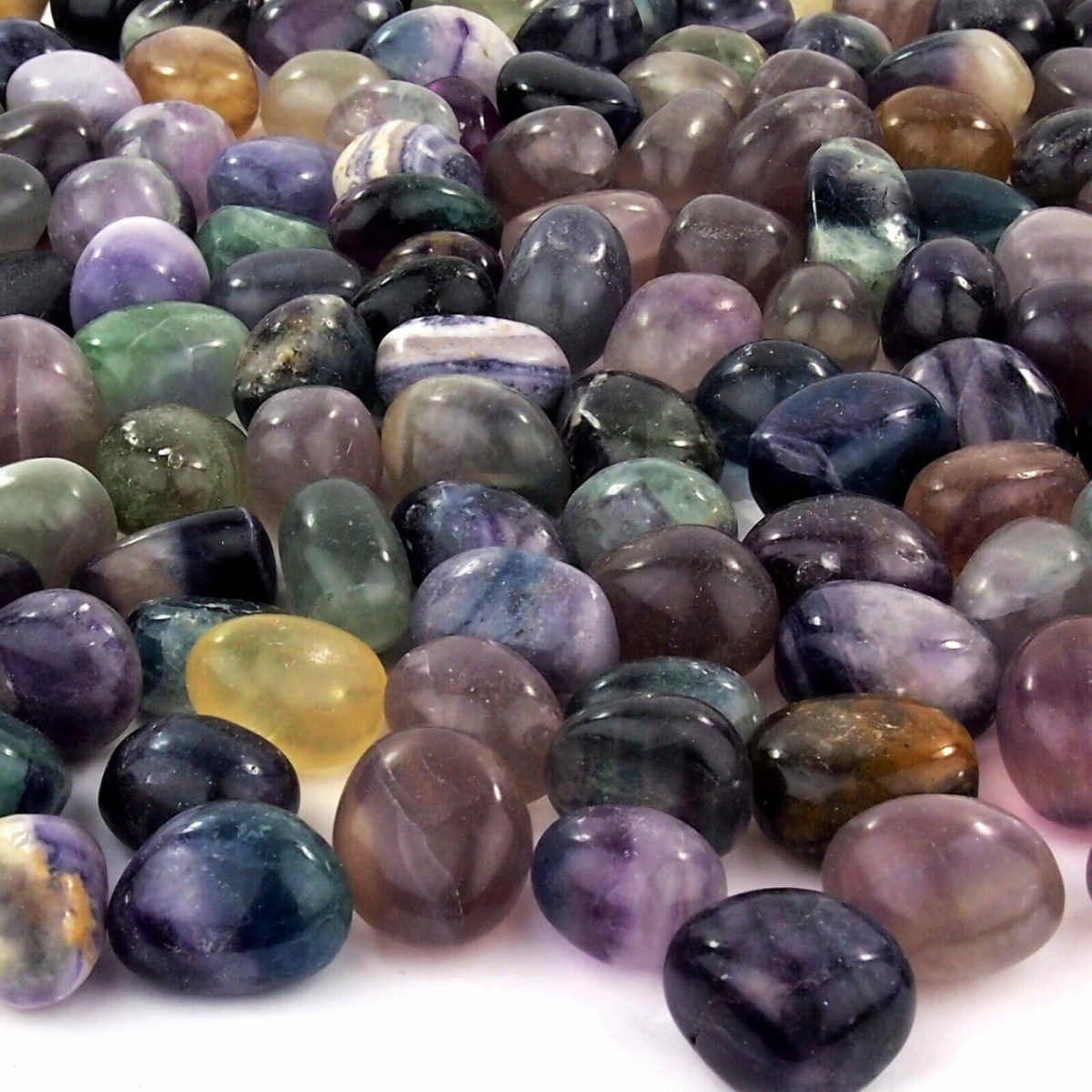 Fluorit Trommelsteine bunt Ø 23 – 33 mm Edelsteine Heilsteine bei Wunderstein24 Fluorit Trommelsteine bunt Ø 23 – 33 mm Edelsteine Heilsteine bei Wunderstein24