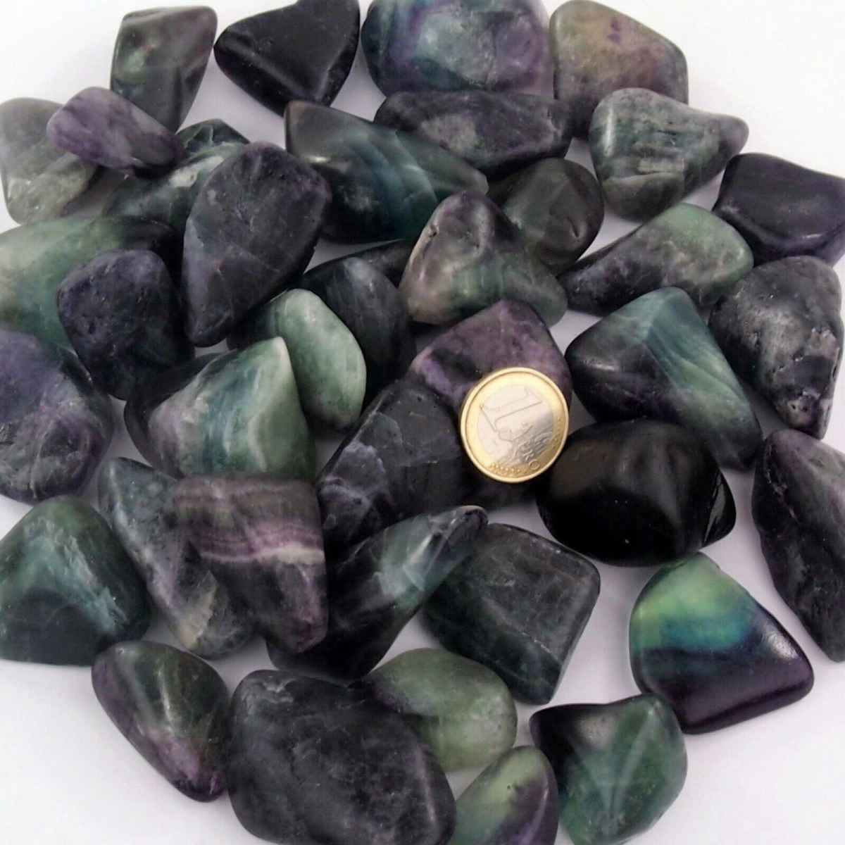 Fluorit Trommelsteine bunt Ø 30 – 50 mm Edelsteine Heilsteine bei Wunderstein24 Fluorit Trommelsteine bunt Ø 30 – 50 mm Edelsteine Heilsteine bei Wunderstein24