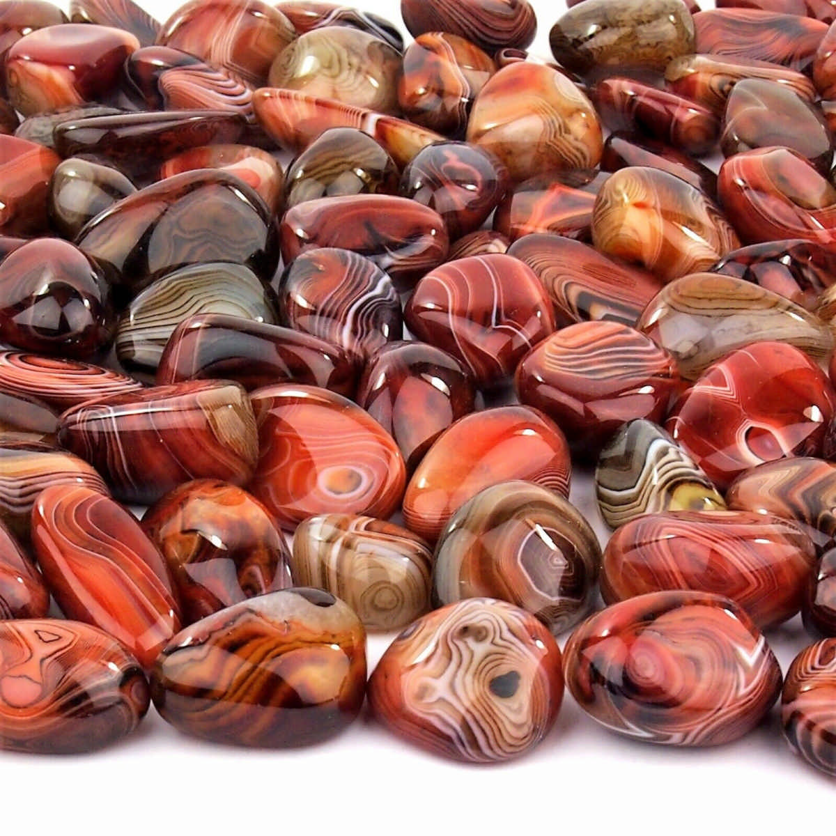 Streifenachat | Achat Trommelsteine handpoliert Ø ca. 33 – 60 mm Edelsteine Heilsteine bei Wunderstein24 Streifenachat | Achat Trommelsteine handpoliert Ø ca. 33 – 60 mm Edelsteine Heilsteine bei Wunderstein24