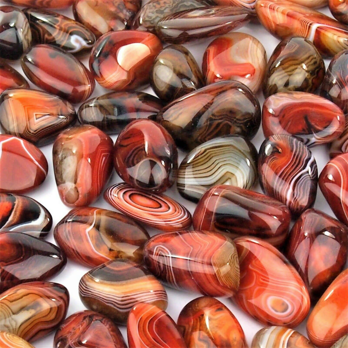 Streifenachat | Achat Trommelsteine handpoliert Ø ca. 33 – 60 mm Edelsteine Heilsteine bei Wunderstein24 Streifenachat | Achat Trommelsteine handpoliert Ø ca. 33 – 60 mm Edelsteine Heilsteine bei Wunderstein24