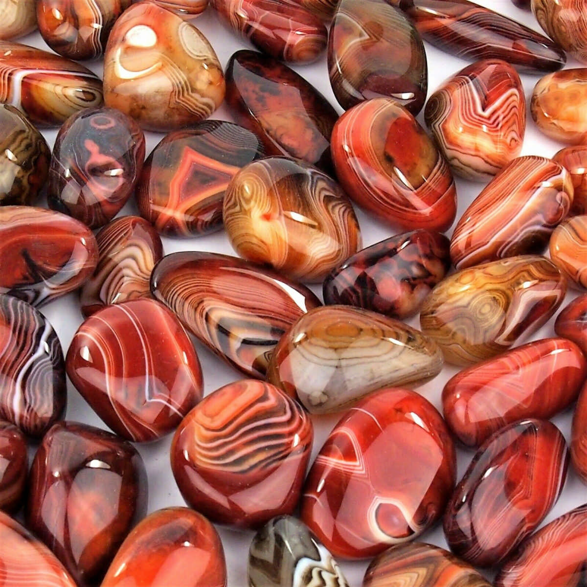 Streifenachat | Achat Trommelsteine handpoliert Ø ca. 33 – 60 mm Edelsteine Heilsteine bei Wunderstein24 Streifenachat | Achat Trommelsteine handpoliert Ø ca. 33 – 60 mm Edelsteine Heilsteine bei Wunderstein24