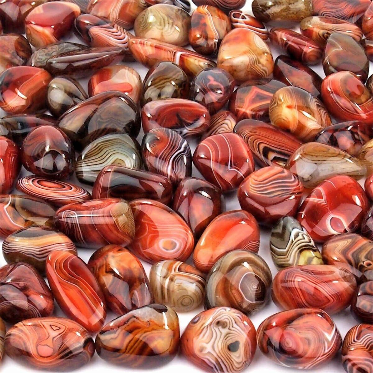 Streifenachat | Achat Trommelsteine handpoliert Ø ca. 33 – 60 mm Edelsteine Heilsteine bei Wunderstein24 Streifenachat | Achat Trommelsteine handpoliert Ø ca. 33 – 60 mm Edelsteine Heilsteine bei Wunderstein24