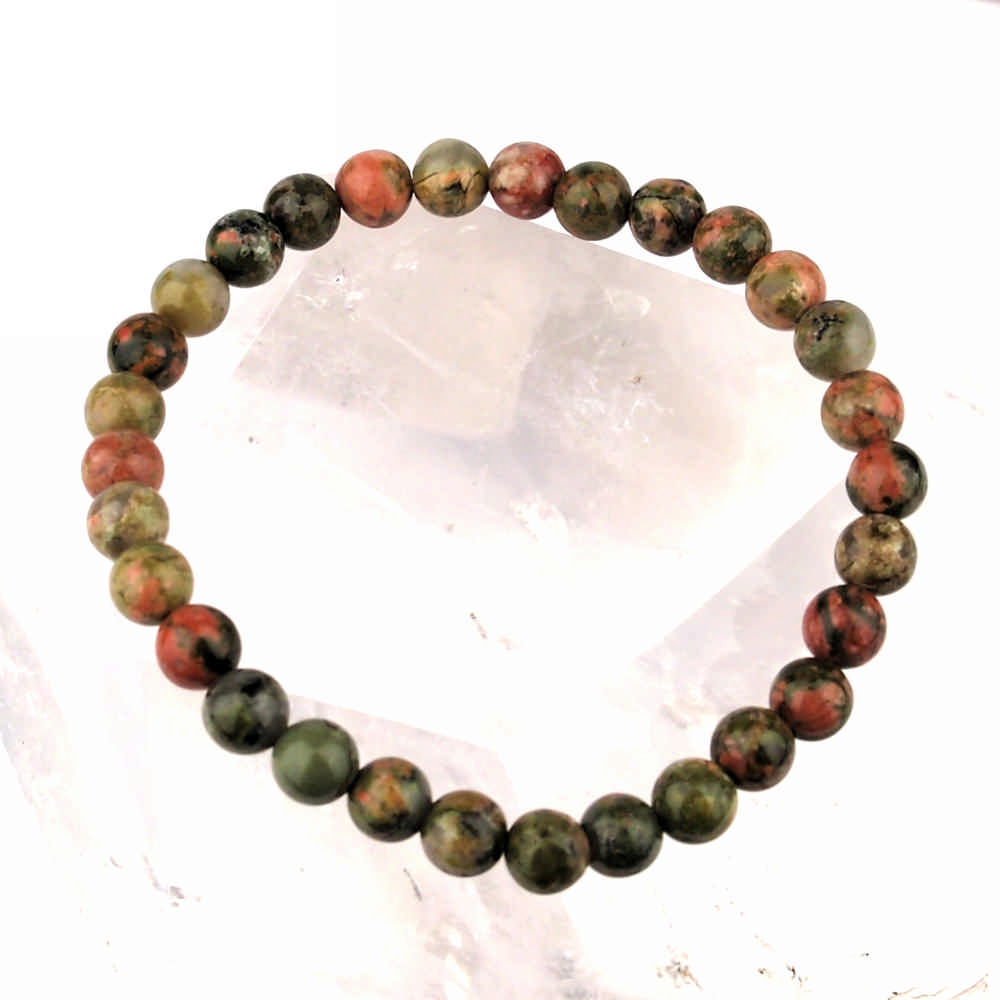 Epidot | Unakit Ø 6 mm Kugel Edelstein Armband flexibel und dehnbar Edelsteine Heilsteine bei Wunderstein24 Epidot | Unakit Ø 6 mm Kugel Edelstein Armband flexibel und dehnbar Edelsteine Heilsteine bei Wunderstein24